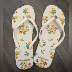Floral Tory Burch flip flops
